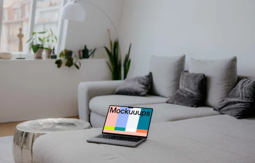 MacBook Pro mockup on the sofa