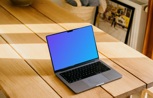 MacBook Pro mockup opened up on a table
