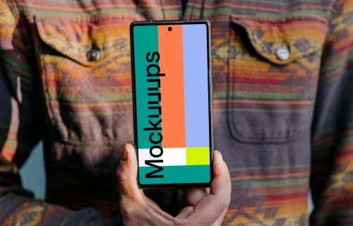 Man holding up a Pixel 6 mockup