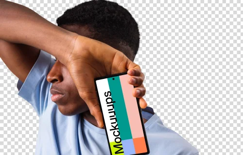 Man in light shirt holding Google Pixel mockup next to the face