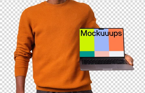 Man in orange sweater holding opened MacBook mockup from the side