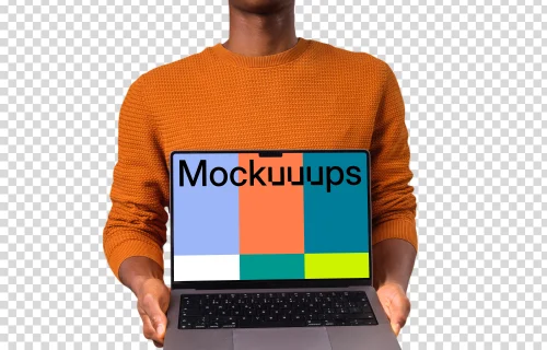 Man in orange sweater holding opened MacBook mockup