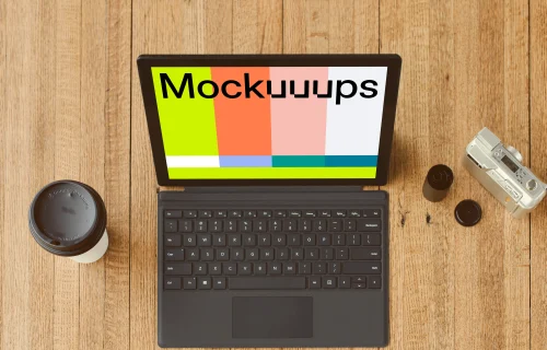 Microsoft Surface Laptop mockup beside a cup of coffee