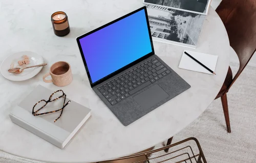 Microsoft Surface Laptop mockup on the table