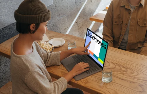 Microsoft Surface Laptop mockup table on a wooden table