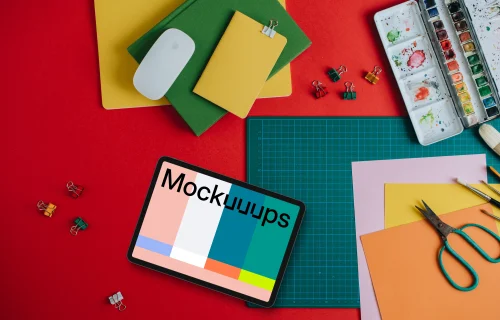 Mockup of tablet surrounded by school equipment