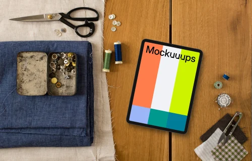 Mockup of tablet with sewing accessories