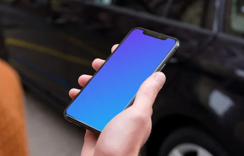 Passenger walking towards a car holding an iPhone 11 mockup