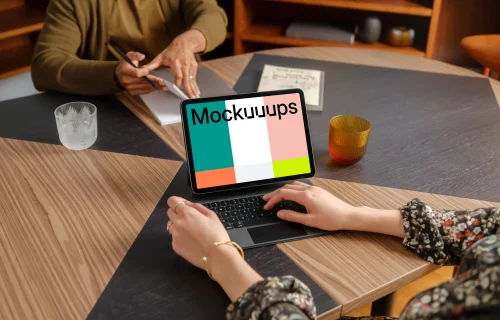 People working in the office with iPad mockup