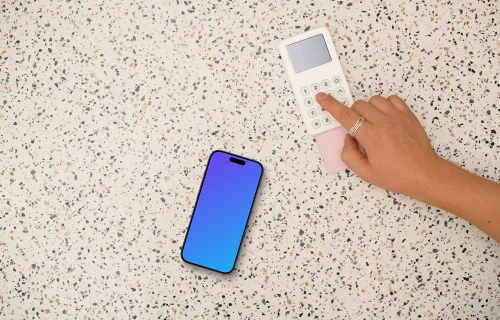 Person paying next to the iPhone mockup