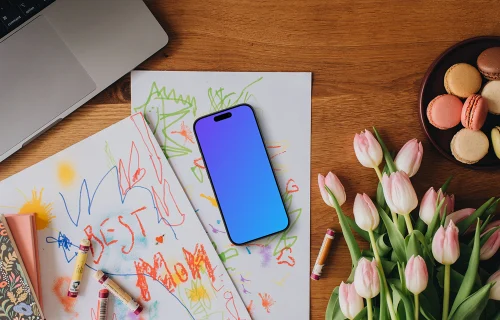 Phone placed on scratched papers for Mother's Day