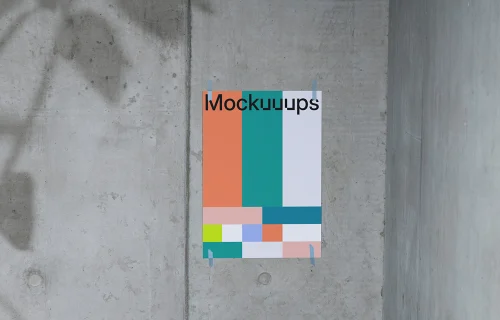 Poster mockup on a concrete wall with natural shadows
