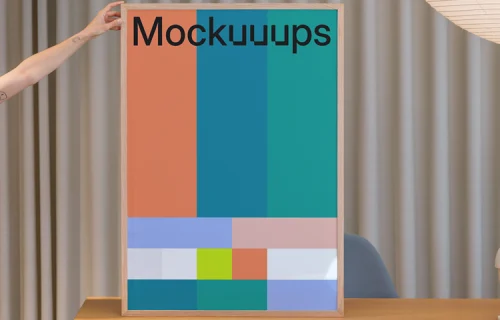 Poster mockup on a wooden desk with neutral background