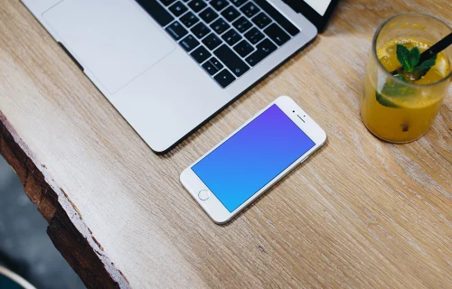Silver iPhone 7 mockup on the wooden table