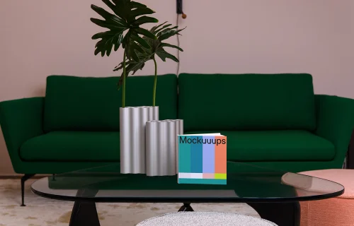 Square book mockup on a modern coffee table