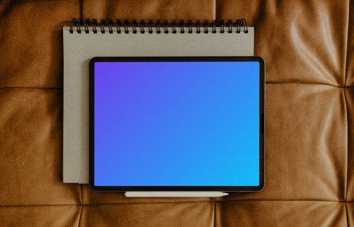 Tablet mockup on a notepad