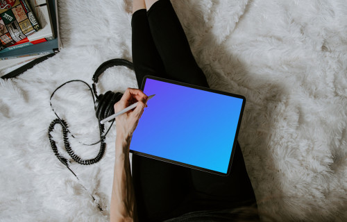 Tablet mockup on a user's lap