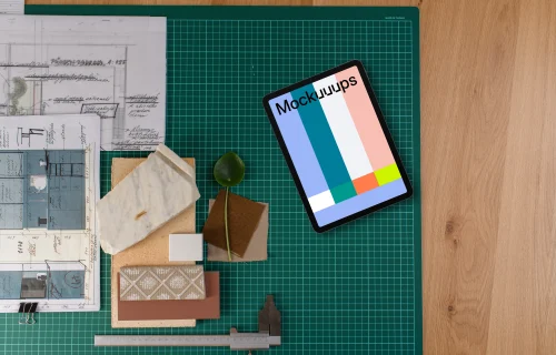 Tablet mockup on architect's planning table