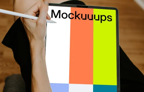 Tablet mockup with Apple pencil held by lady