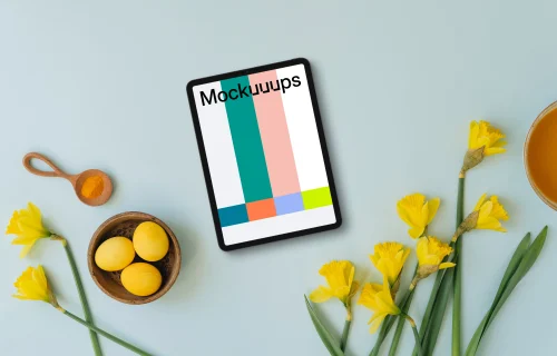 Tablet mockup with yellow Easter eggs