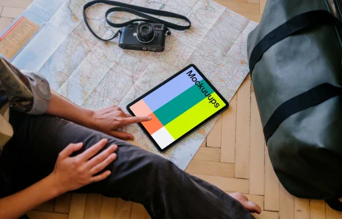 User typing on an iPad Air mockup
