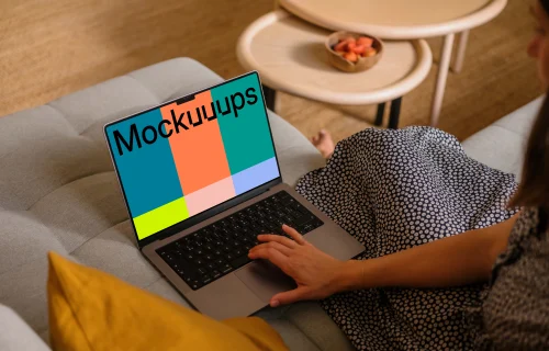 Woman hand scrolling on MacBook Pro mockup