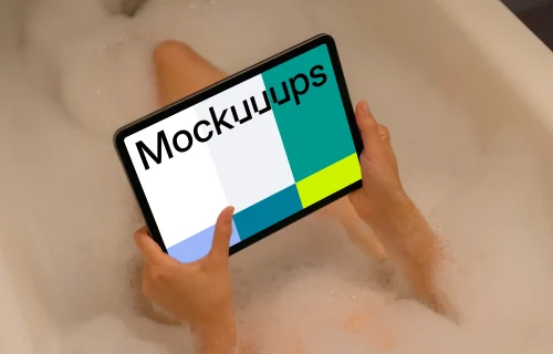 Woman hand typing on an iPad Air mockup