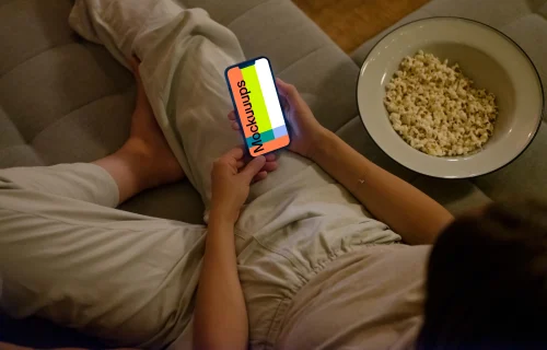 Woman hands holding an iPhone mockup