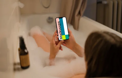 Woman holding a phone mockup