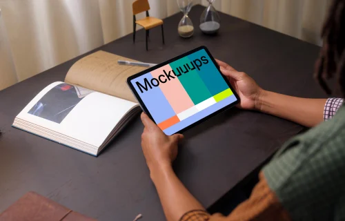 Woman holding an iPad Air mockup
