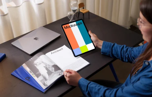 Woman holding an iPad Air mockup 