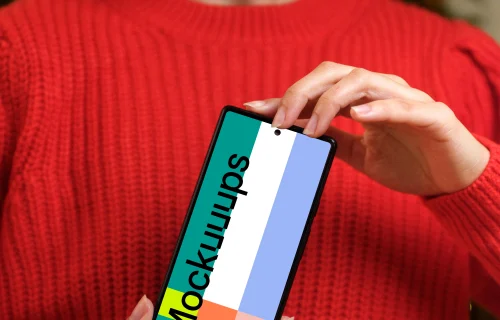 Woman in red sweater holding a Google Pixel 6 mockup