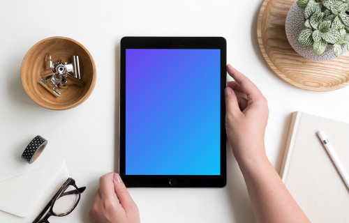 Woman reading on iPad Pro mockup
