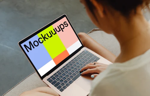 Woman working on a MacBook Air mockup