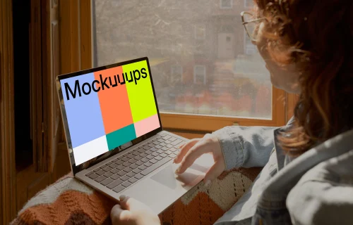 Woman working on laptop mockup