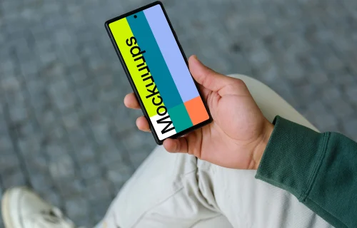 Young man reading on Google Pixel 6 mockup