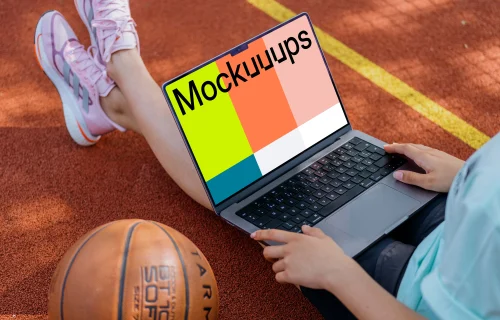 Young woman working on a MacBook Pro mockup
