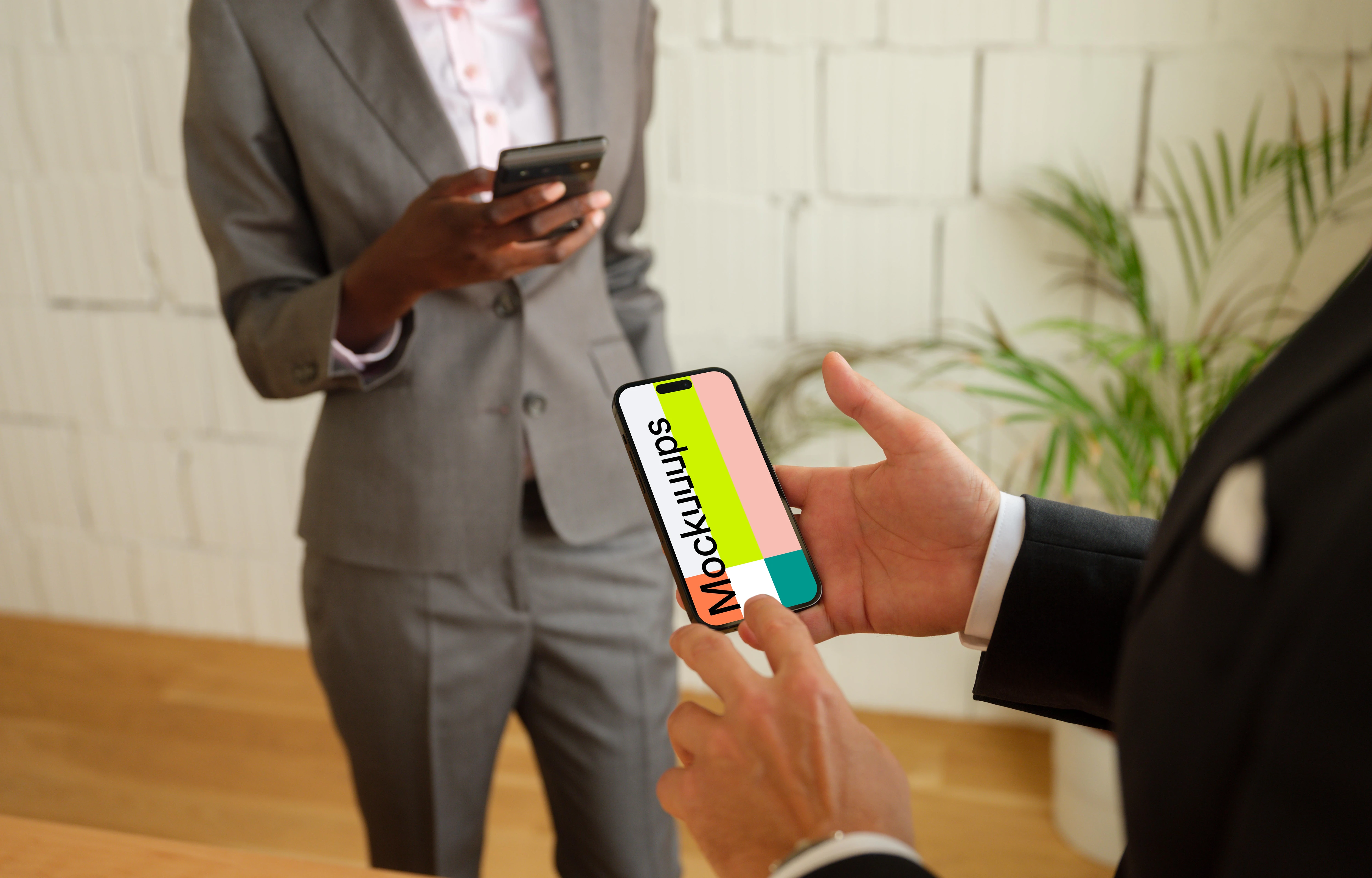 Businessman typing on a iPhone mockup