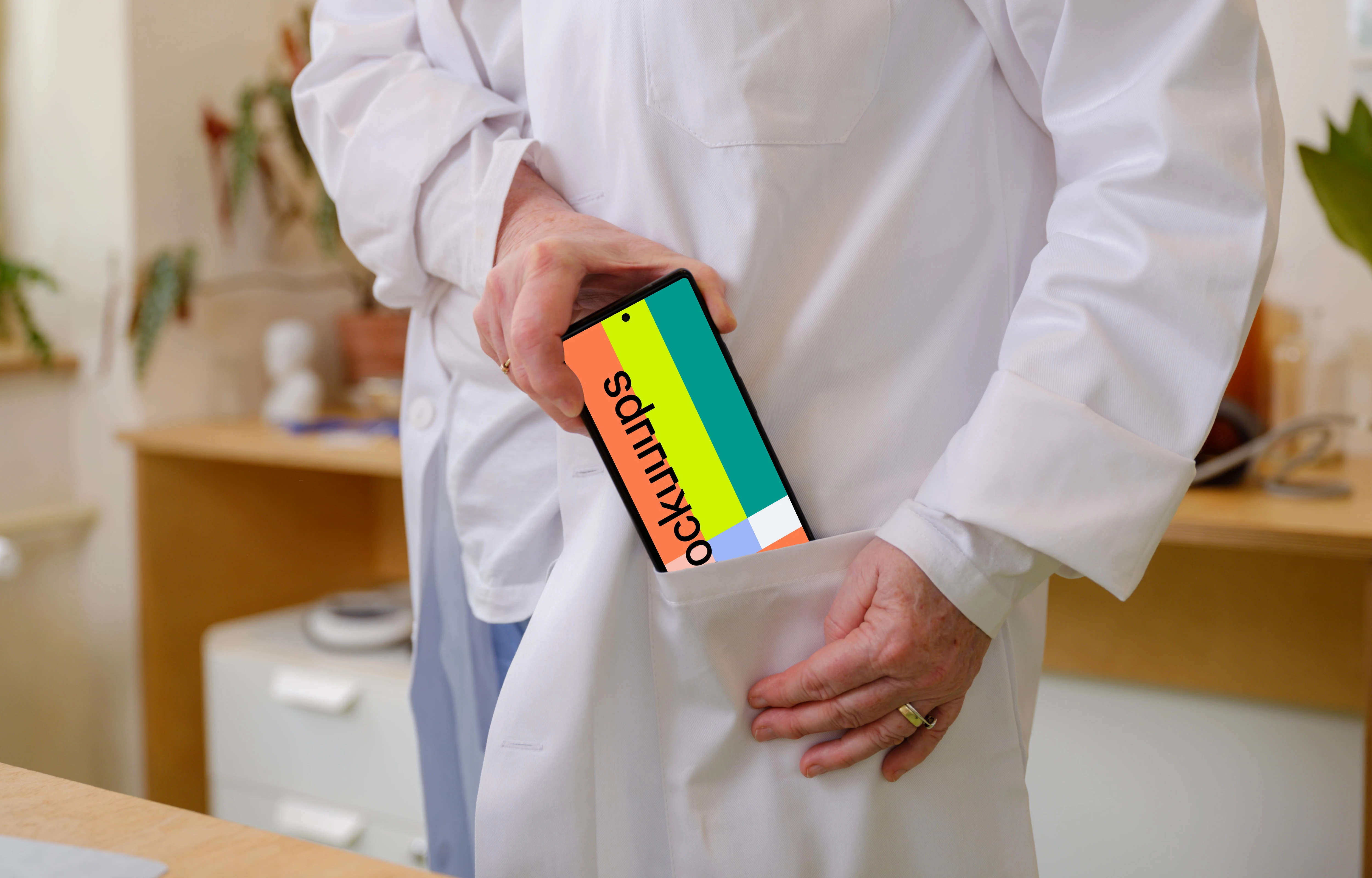 Doctor putting the phone into her pocket