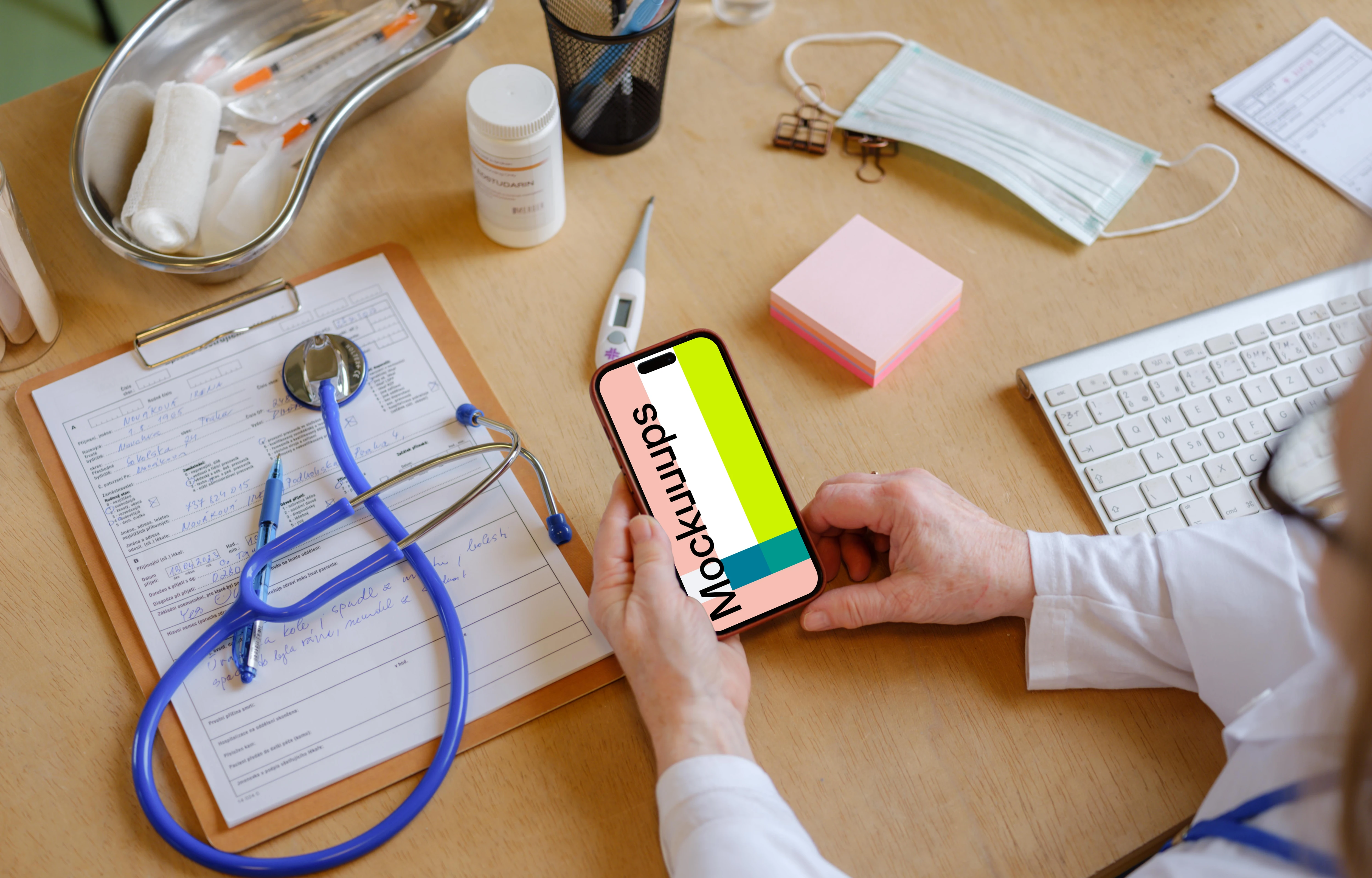 Female doctor holding an iPhone