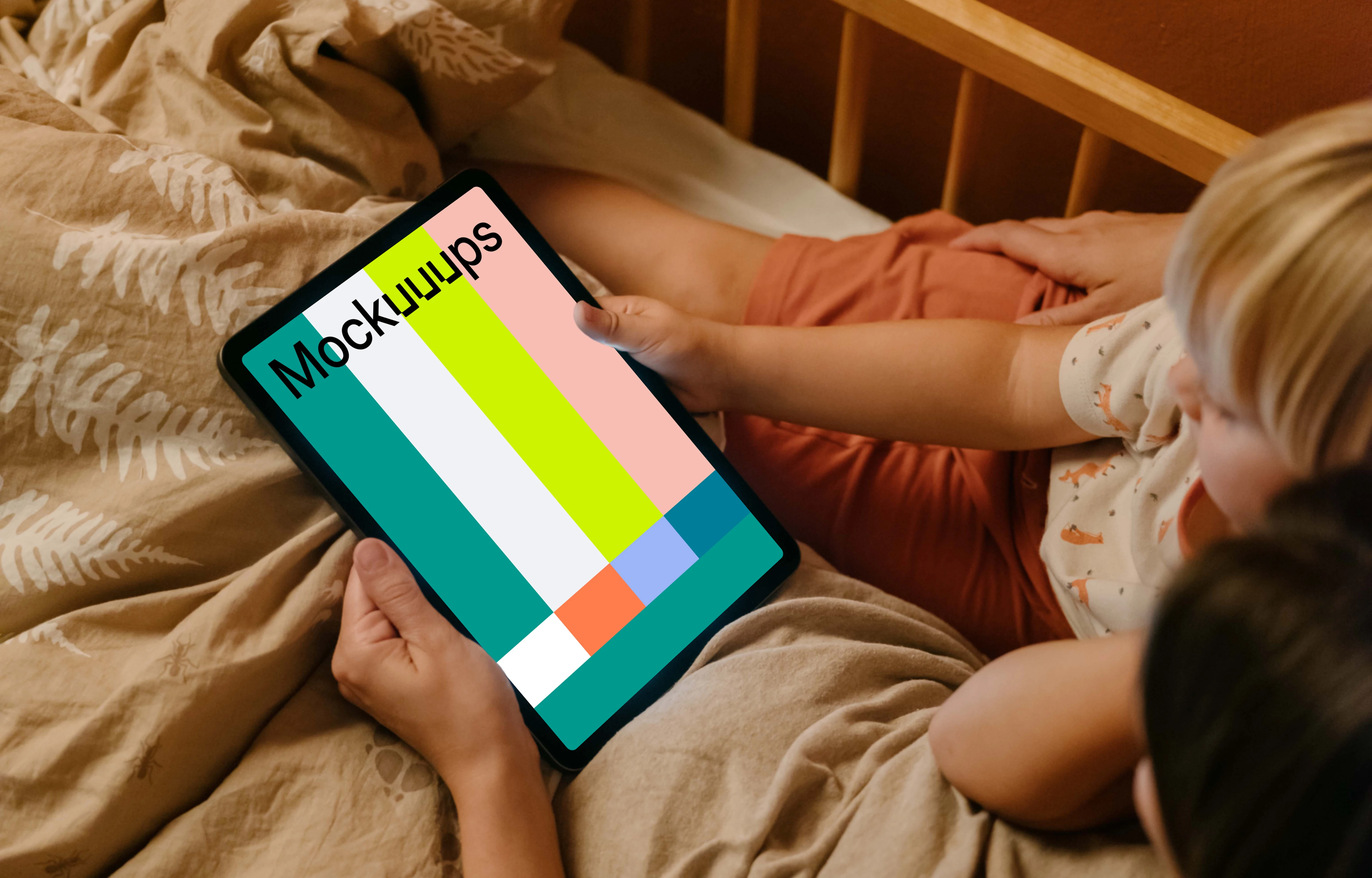Female hand holding a tablet mockup