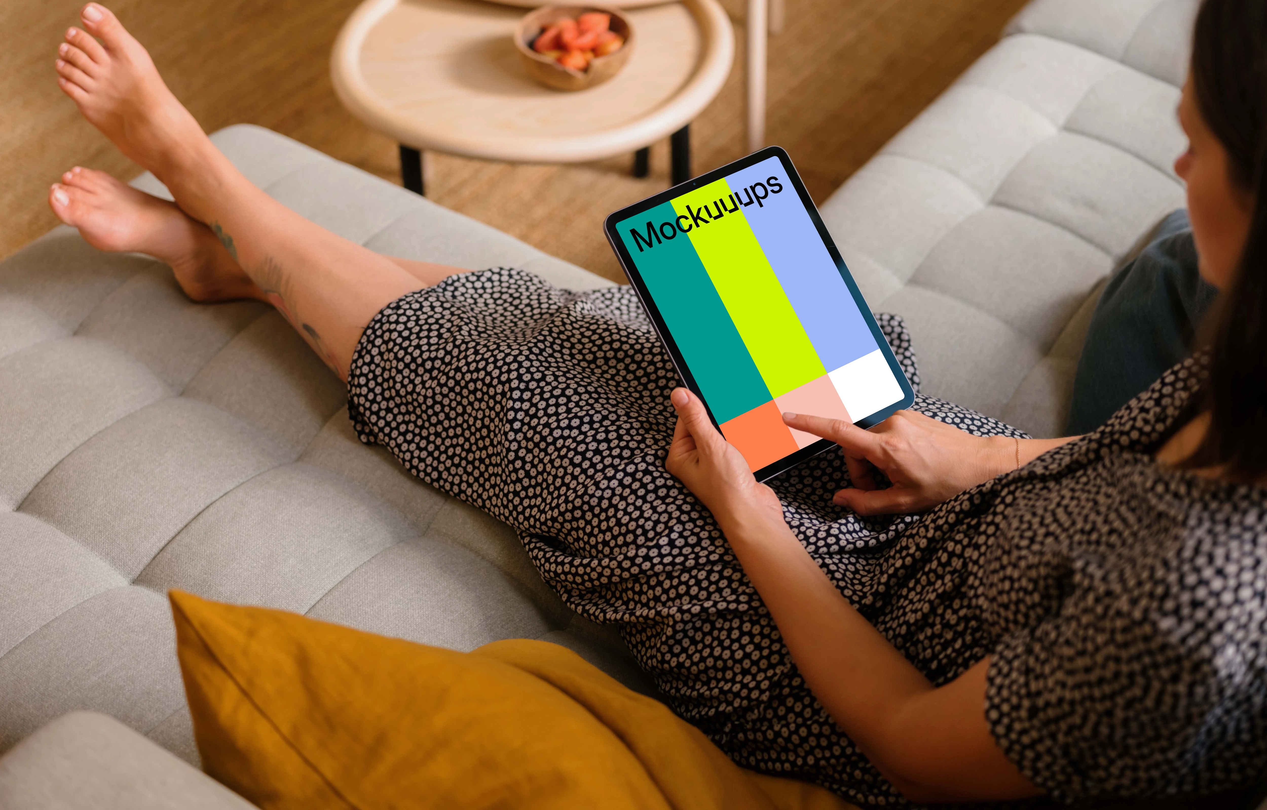 Female typing on an iPad Air mockup