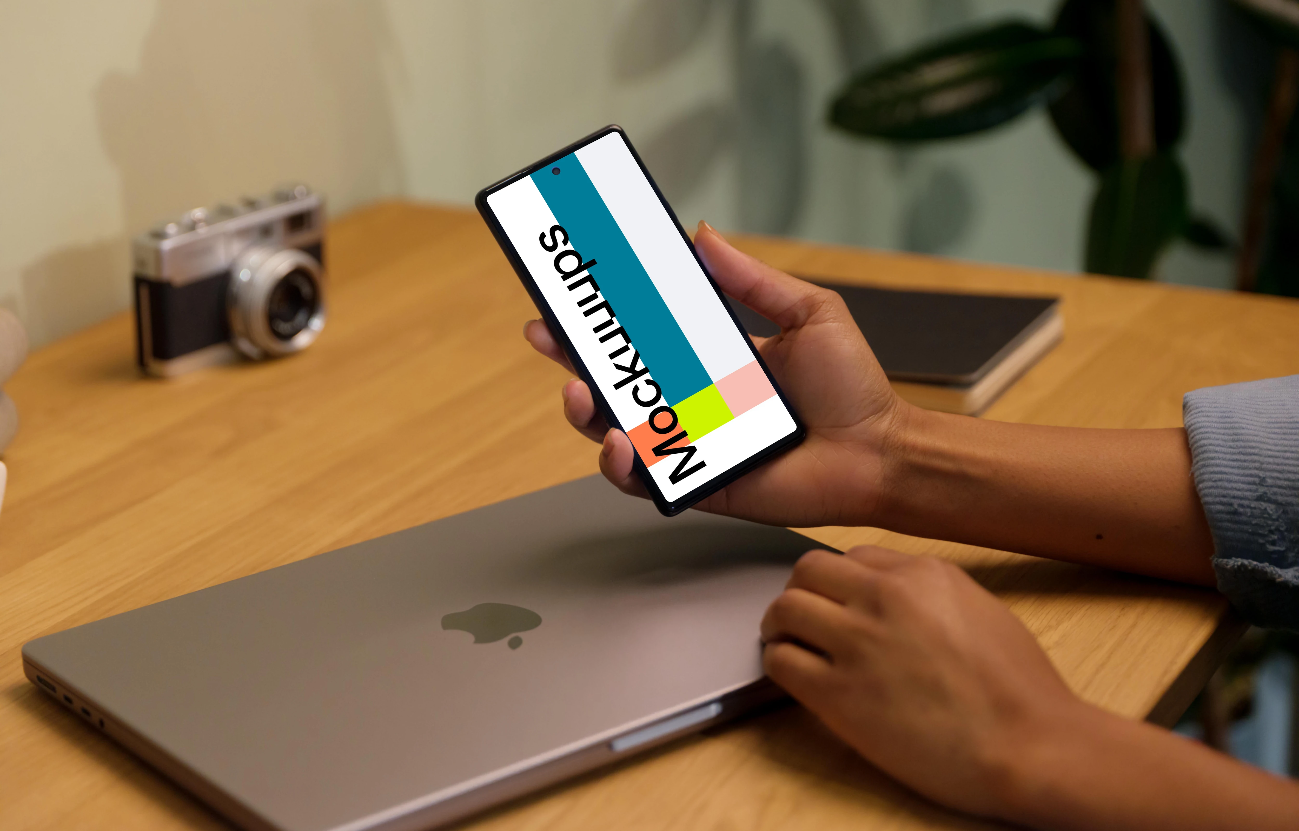 Hand holding a Google Pixel 6 mockup