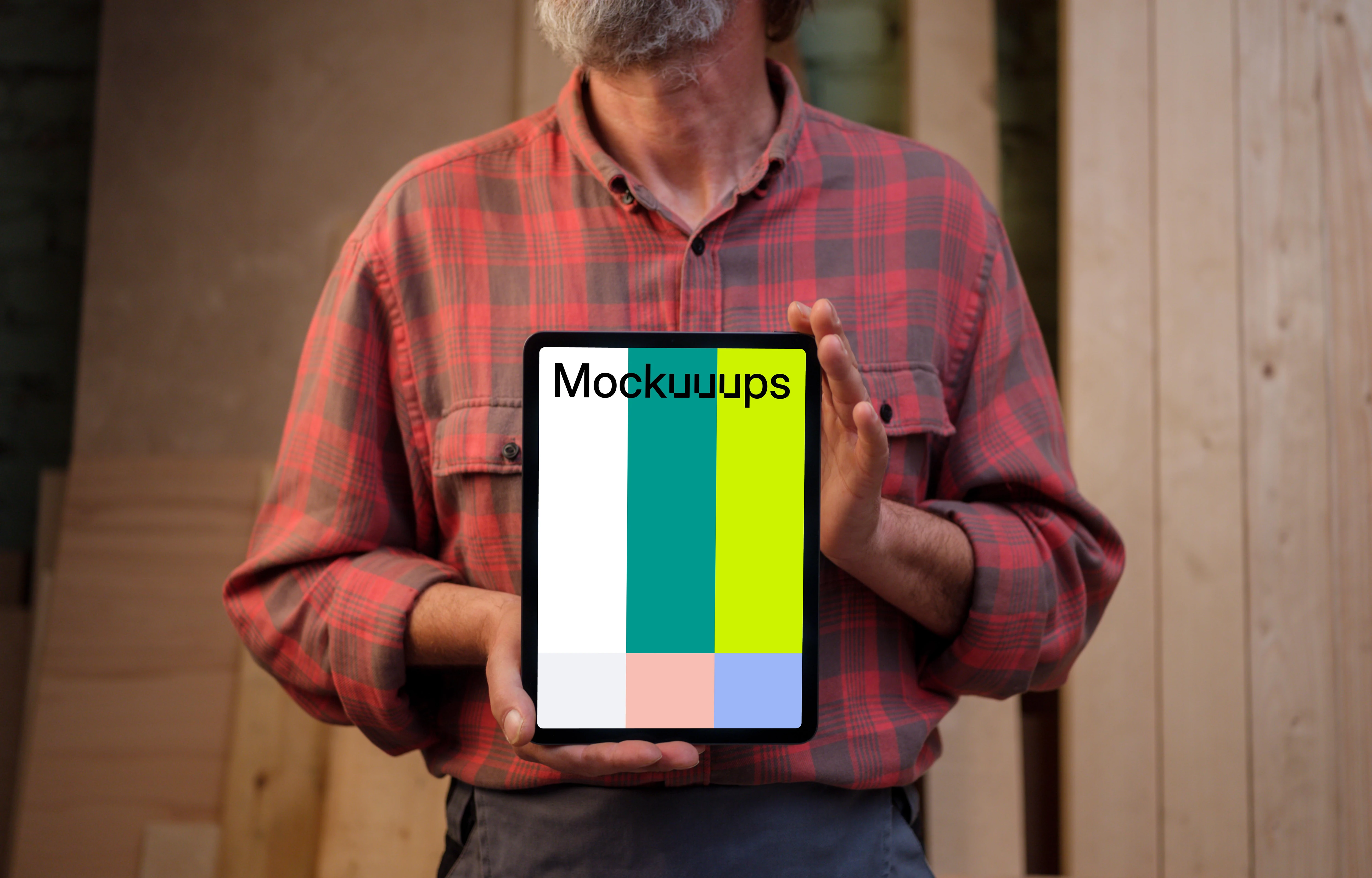 iPad mockup held by a repairman