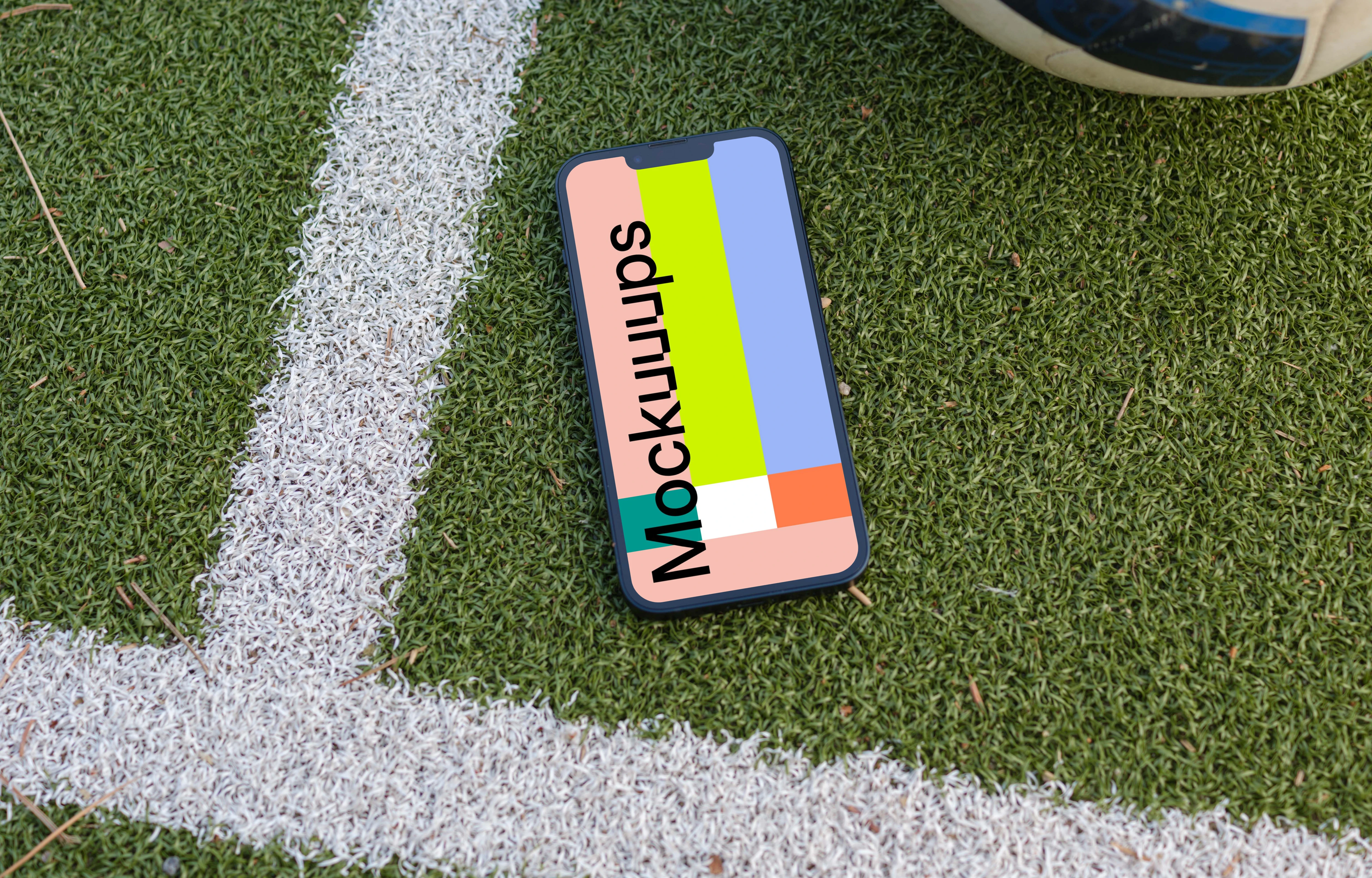 iPhone 13 mockup on the grass