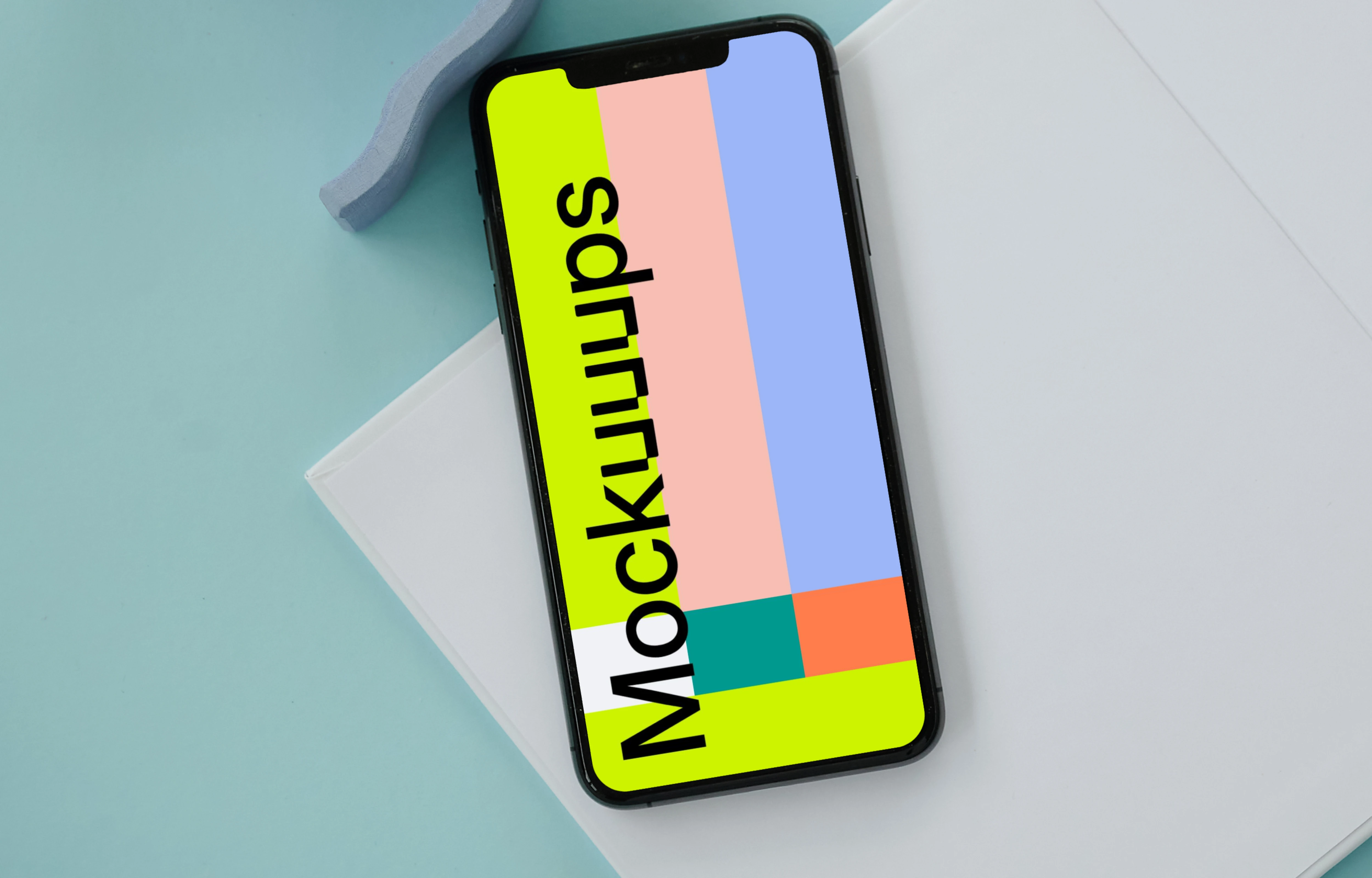 iPhone mockup on a white notepad