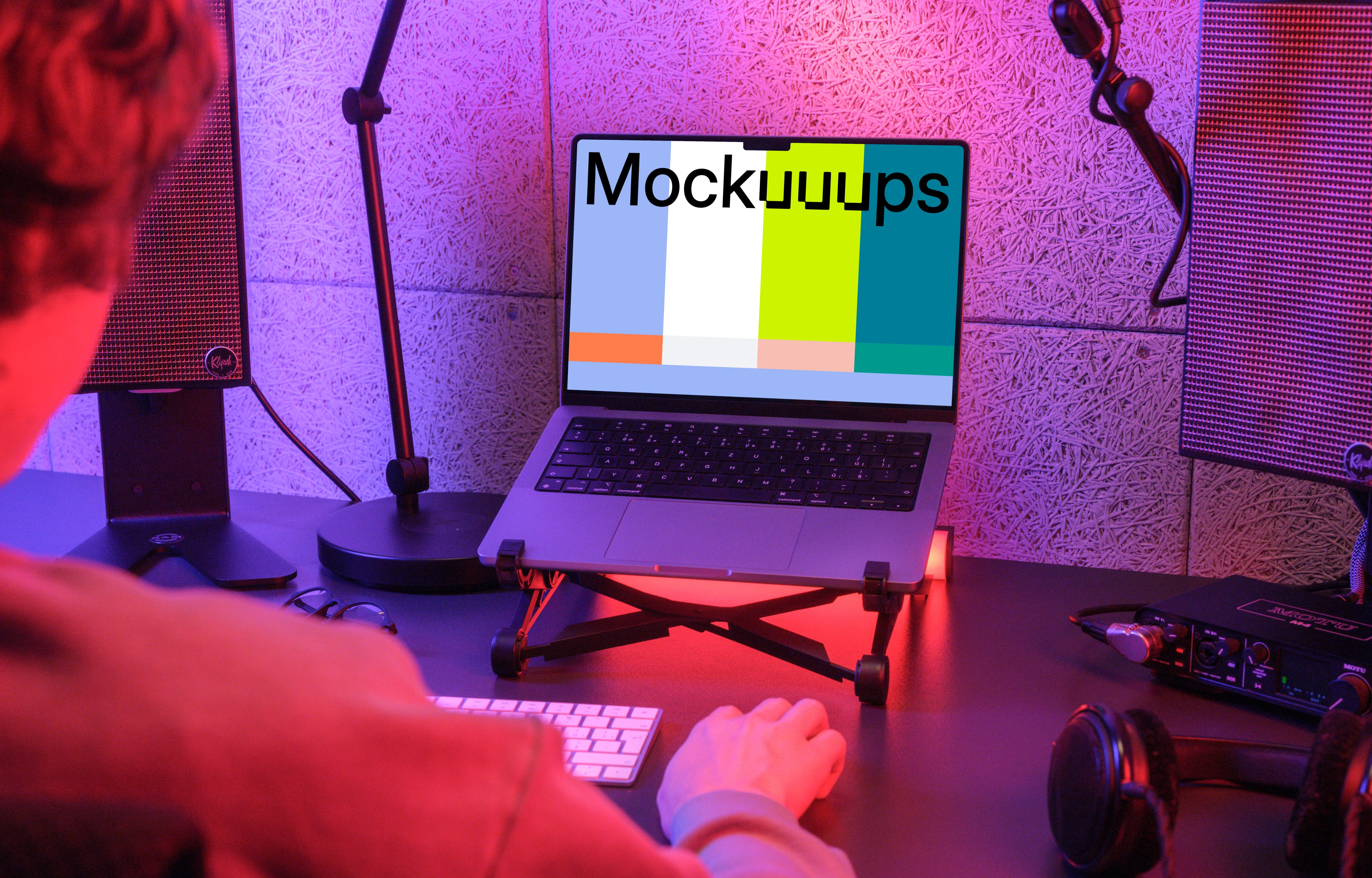 MacBook Pro mockup in a dynamic gaming setup