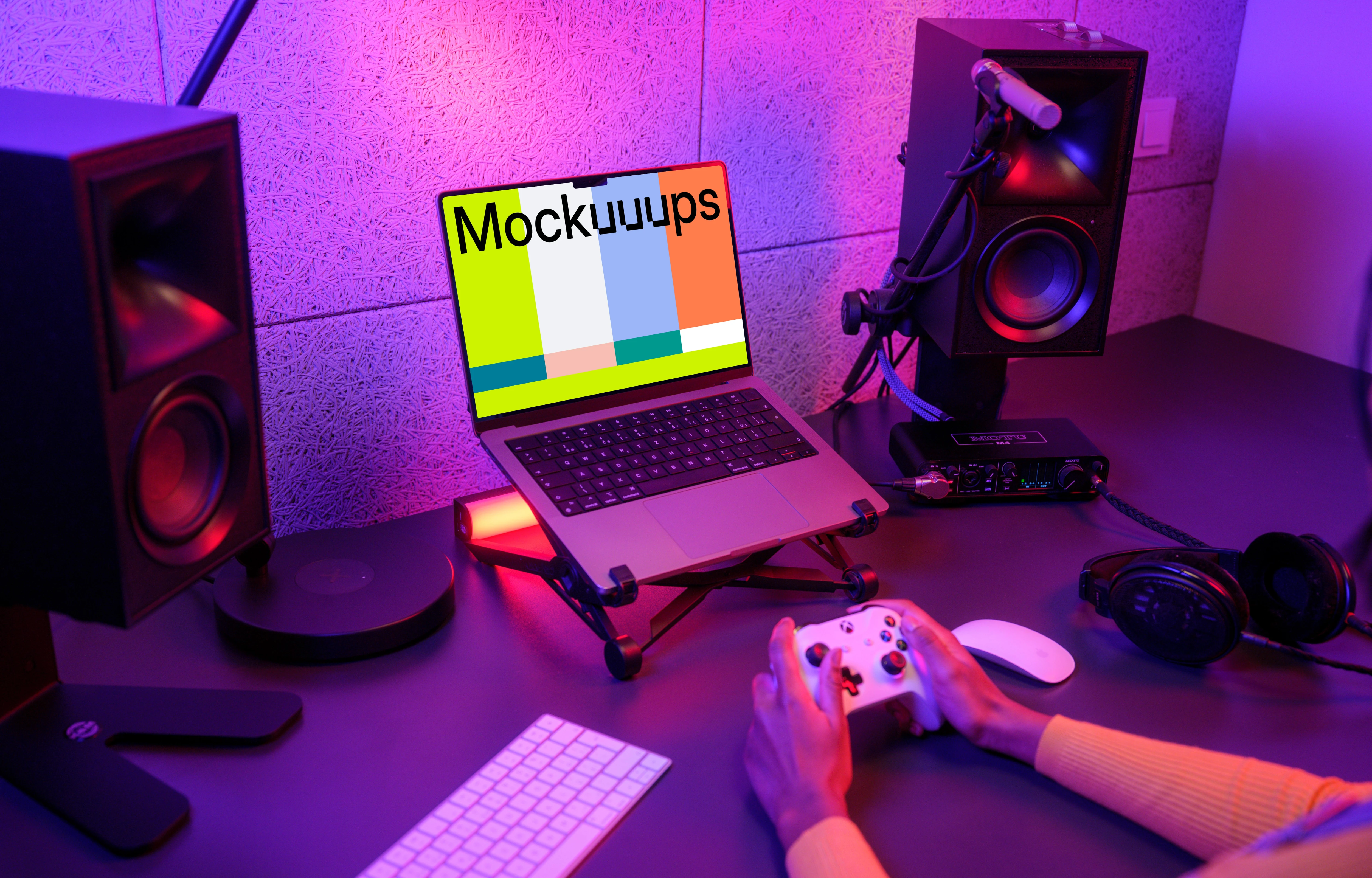 MacBook Pro mockup in a neon-lit gaming setup