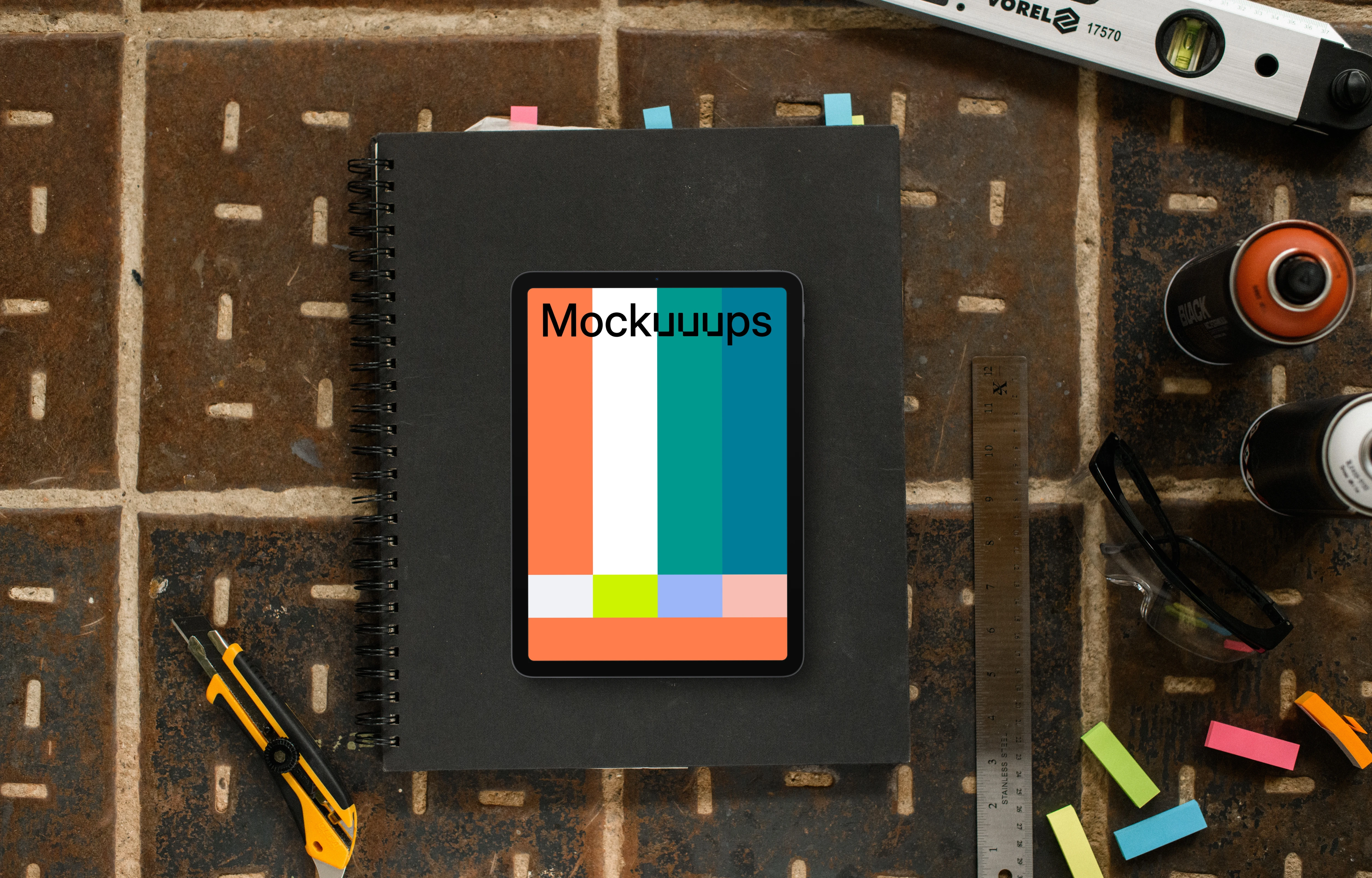 Tablet mockup on architect's desk with tools