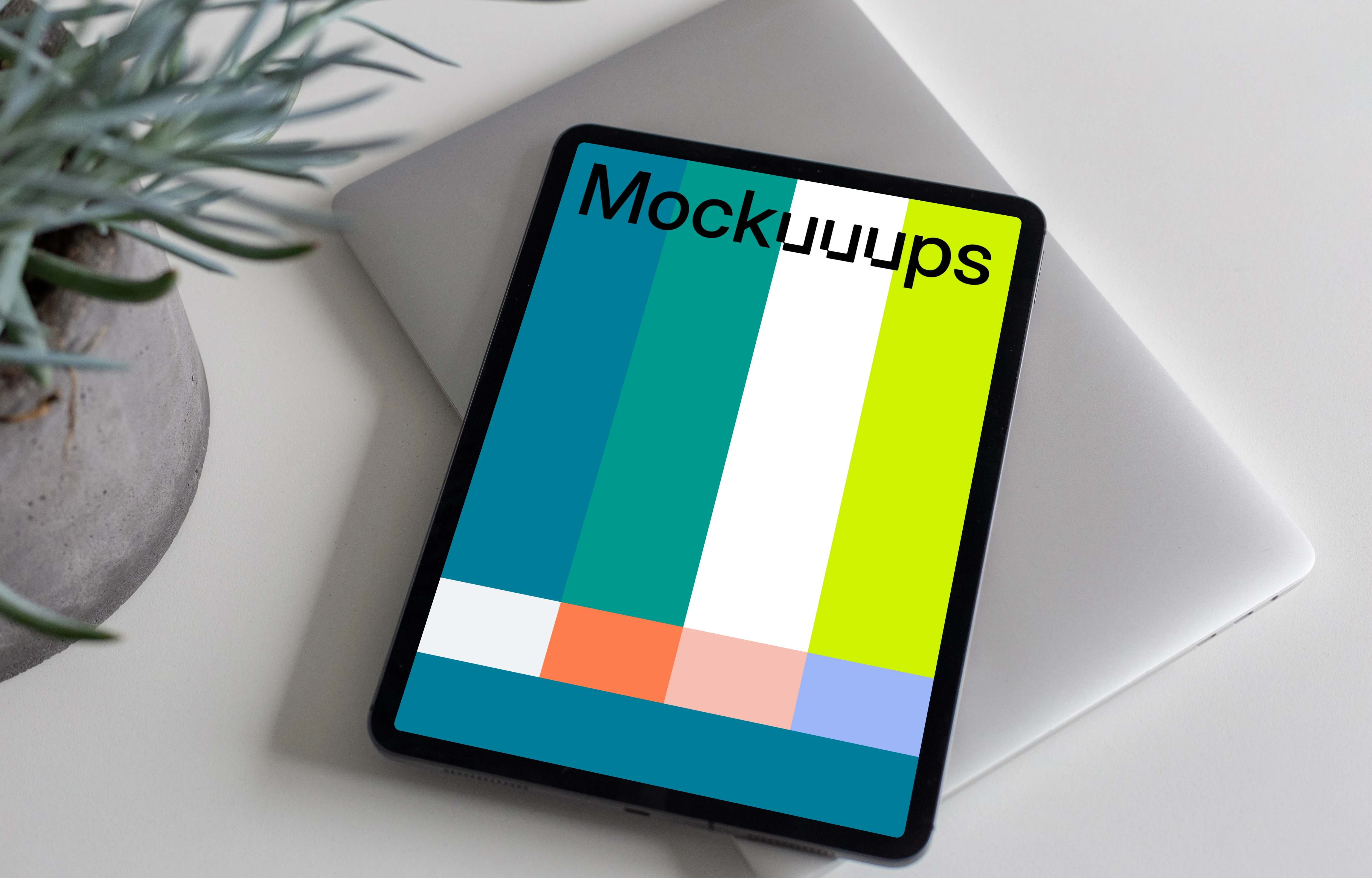 Tablet mockup on top of the MacBook